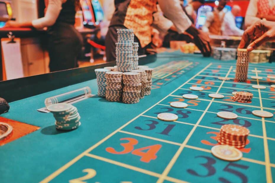 a casino table with a lot of chips on it
